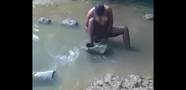  hot african woman taking bath